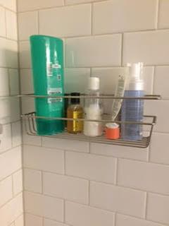 How to Use Adhesive Strips to Organize Your Bathroom