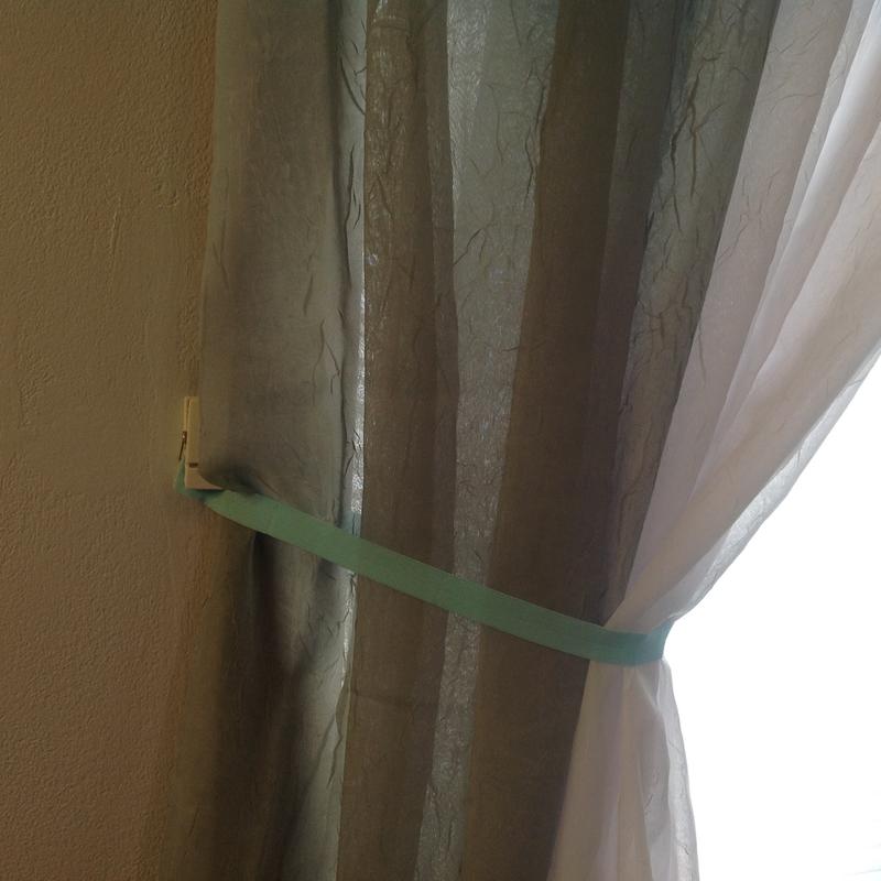 Tie back on curtain with Command clip
