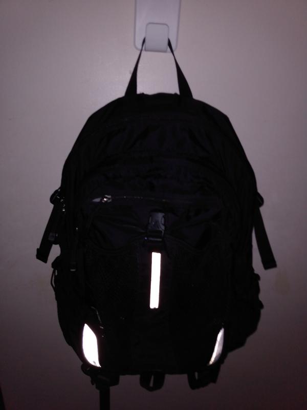 10lb backpack on the hook applied to a painted wall.