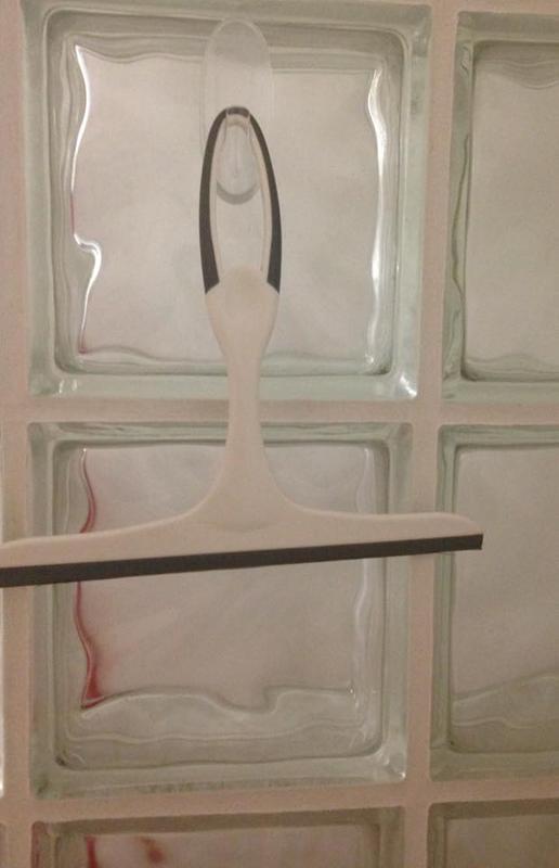 Keeps the shower squeegee close at hand for swiping down shower walls