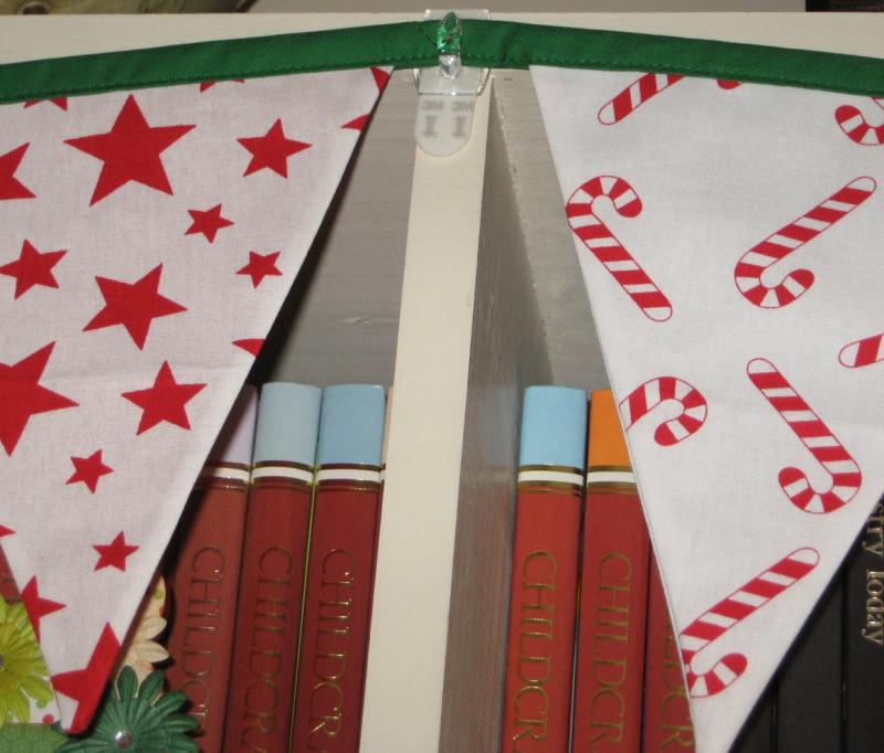 Hanging up the Christmas bunting