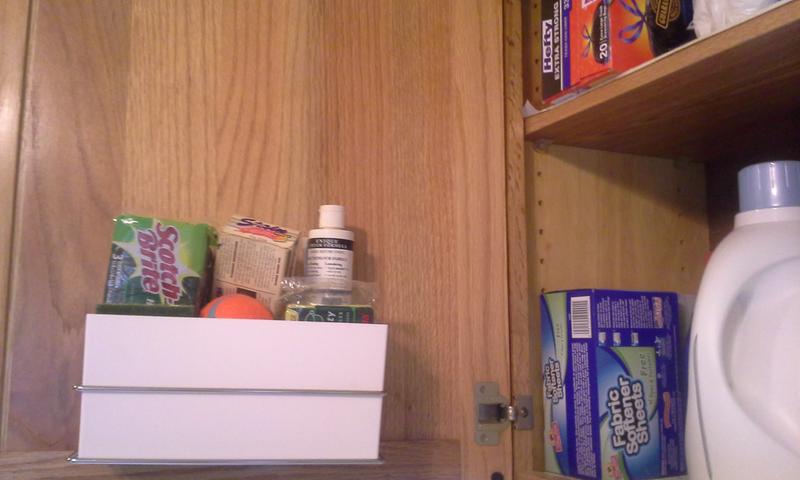 3M-Command Satin Holder and Bin inside my laundry cabinet.