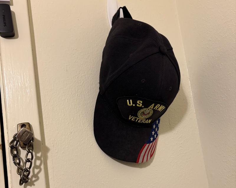 Veteran's hat on hook.