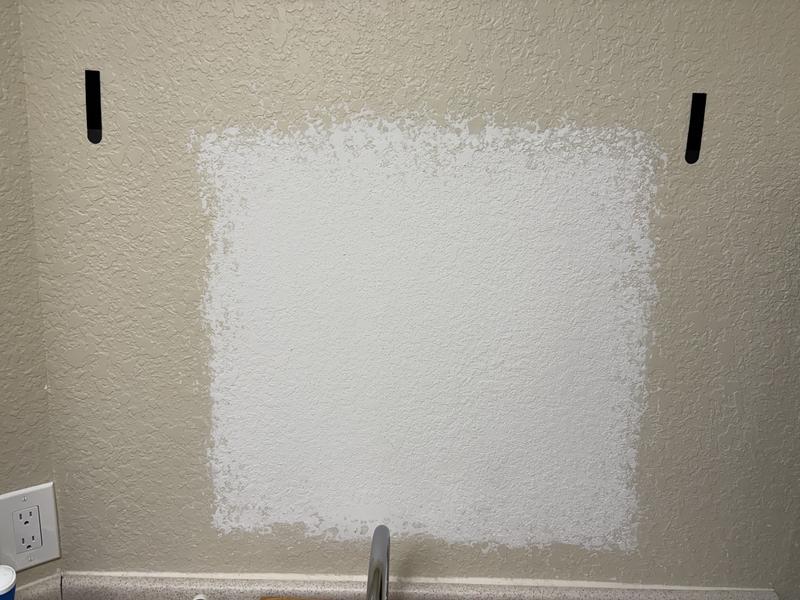 After putting both hangers and placing on wall