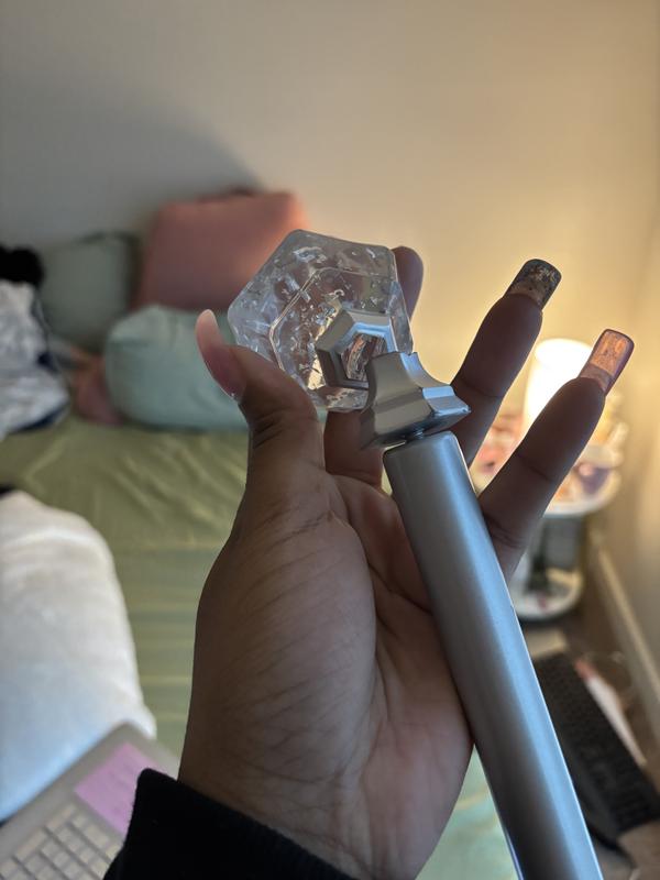 Broken curtain rod, Hook that fell and the one that chose to stay on the wall