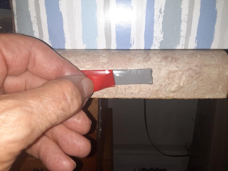 Photo 2: Pull red backing parallel