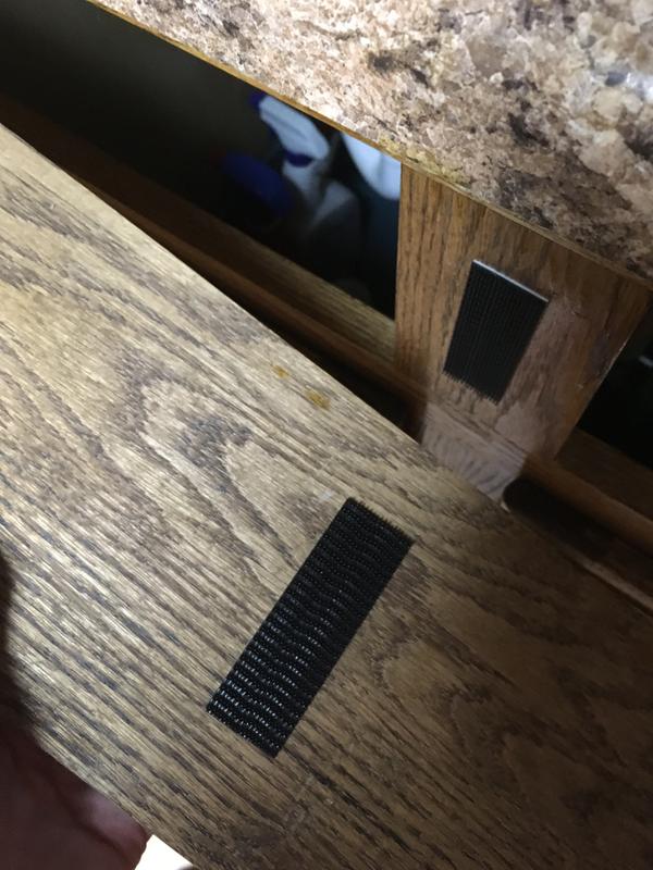 I was able to pull it off to access under the sink and then put it back up with no weakening of the connection