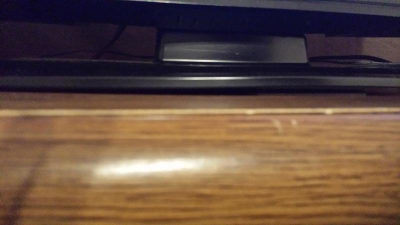 Fasteners under flatscreen tv.