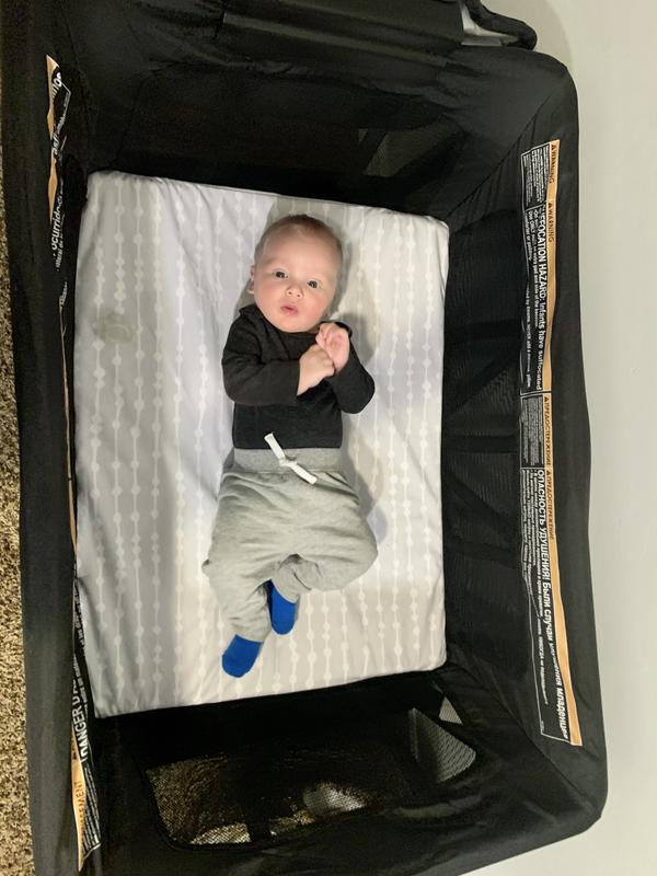 Little man on these cozy bassinet sheets!