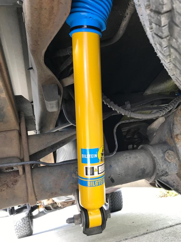 Bilstein 4 4600 Series Yellow Shocks with 4 Blue Shock Boots, Gas