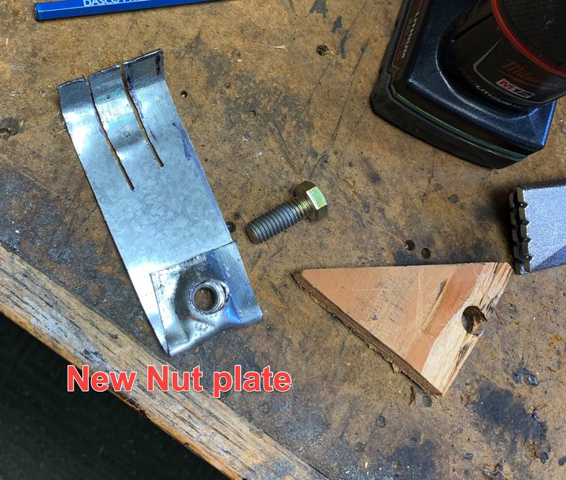 Made a new nutplate, sheet metal smashed in vise to trap nut. And bent so it can't slip down and get lost