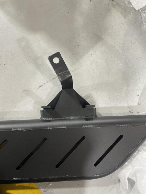 Bent bracket, powder coating rubbed from welds