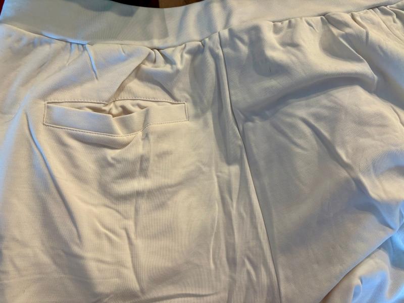 Customer photo for "They changed the design and won't let me exchange- unflattering back pocket added"