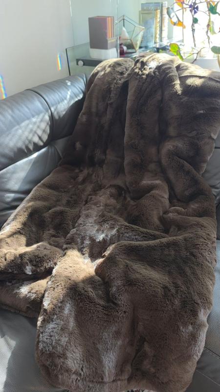 Customer photo for "Everyone in my house is obsessed with this blanket"
