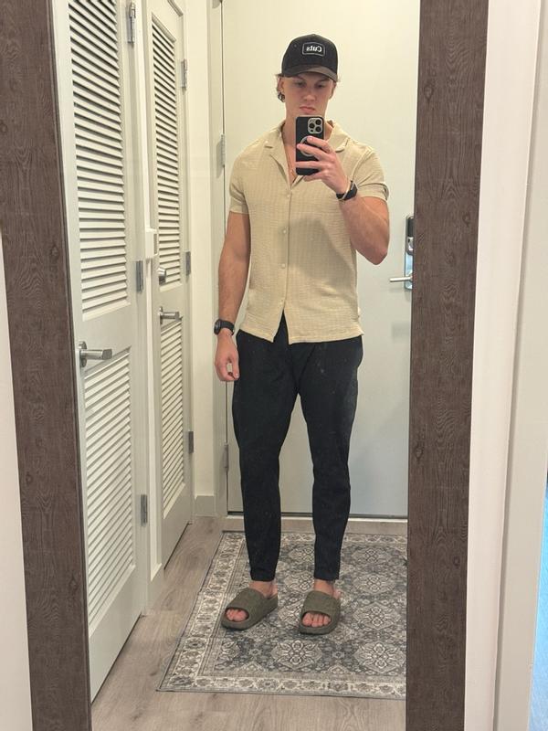Customer photo for "Super comfy and stylish sliders"