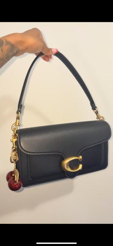 I paired this bag with the Coach cherries and I love it! This bag has the perfect amount of space!