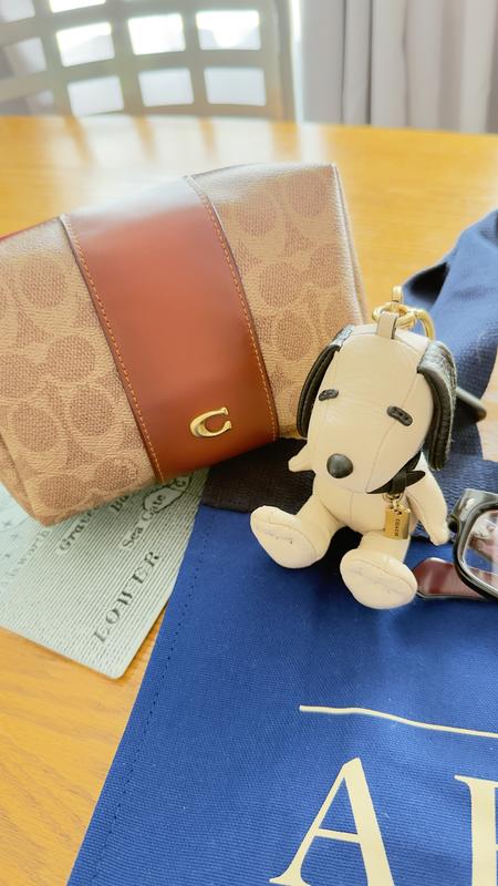 My Essential Cosmetic Pouch In Signature Canvas with my Coach Snoopy Bag Charm!
