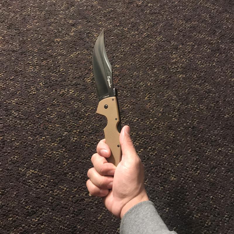 Wash the finger stains off on the blade (Water & Cloth) and you get this BEAUTIFUL polished blade!