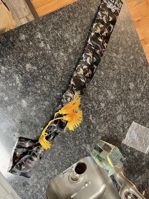 The cloth cover is beautiful. Nicer than my other two swords.