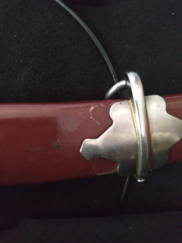 The bottom mounting piece, you can see the glue from where its moved from
