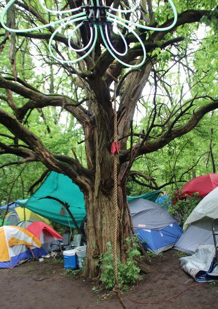 Rainy weekend camping is still fun with friend and Coleman coolers full of tasty treats.