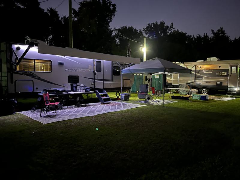 10 x 10 Canopy Sun Shelter with Full-Length Shade Wall | Coleman