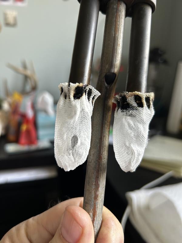 Photos depicting holes in mantels after first firing