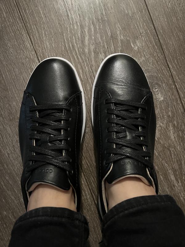 Both shoes put on when I noticed something on the right side