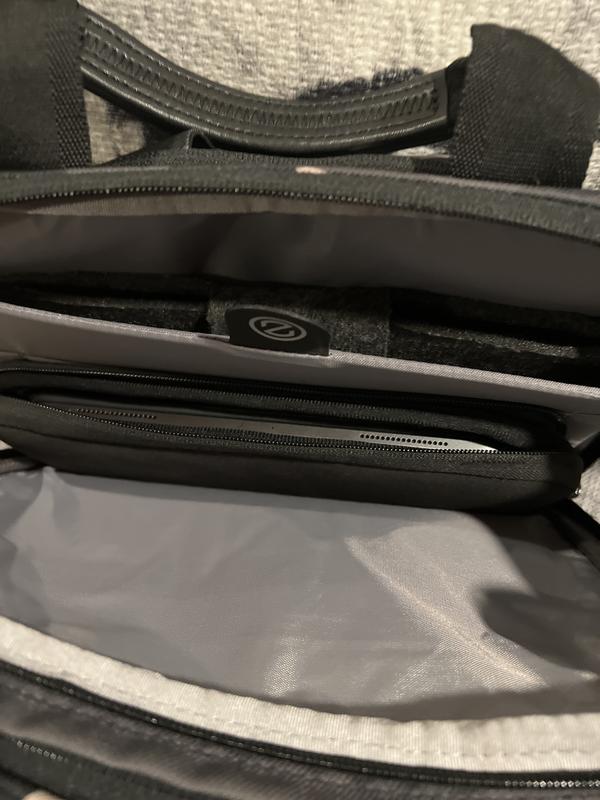 iPad and MacBook in backpack