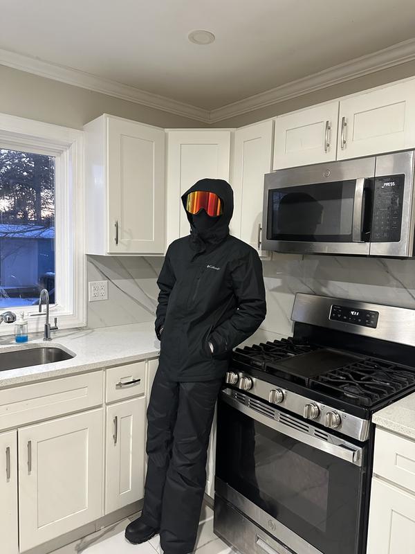 My son in mountain while skiing