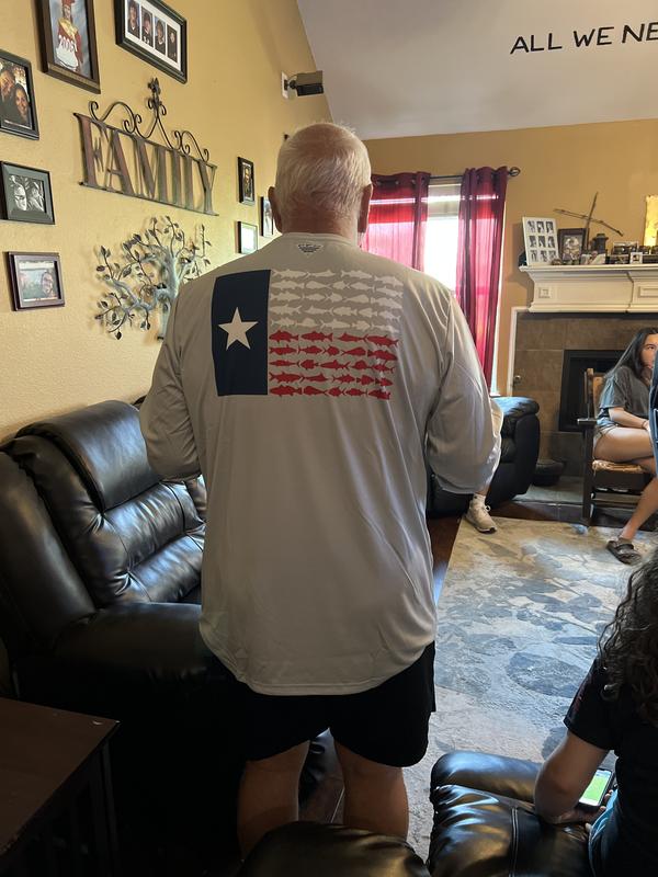 1X - he usually wears a 2X Tshirt.