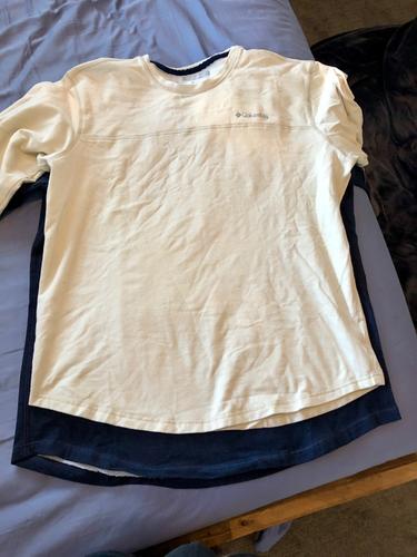 Discolors from sweat and shrinks 2 sizes