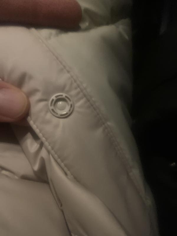 Buttons are cheap plastic and. Pop right off when unbuttoning.