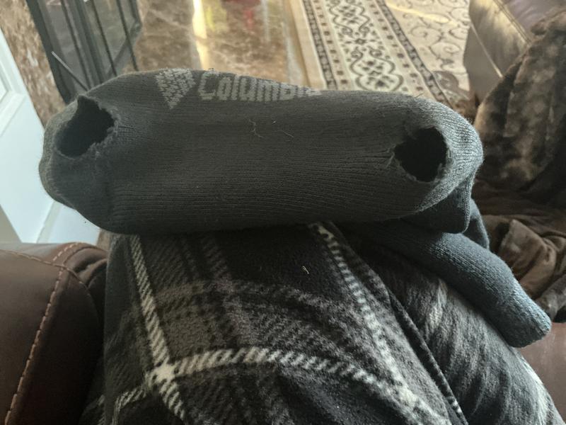 Holes in socks.