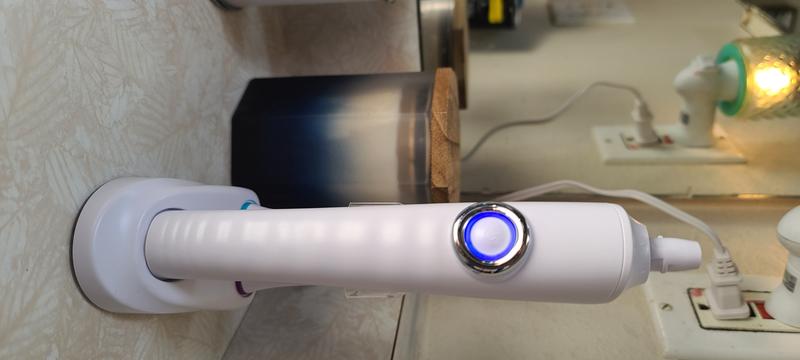 The blue light means it's charging.