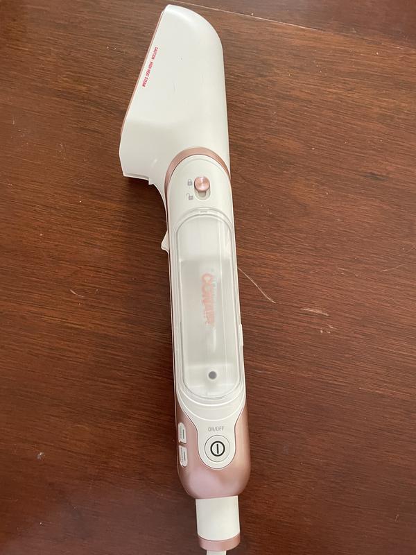 Side with turbo and normal steam button on bottom of product.