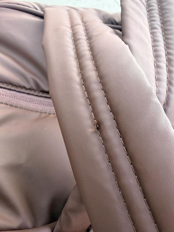 Customer photo for "The stiching isn't even and"