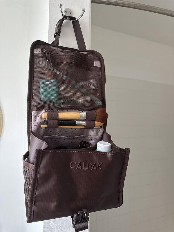 Customer photo for "Love this compact toiletry bag"