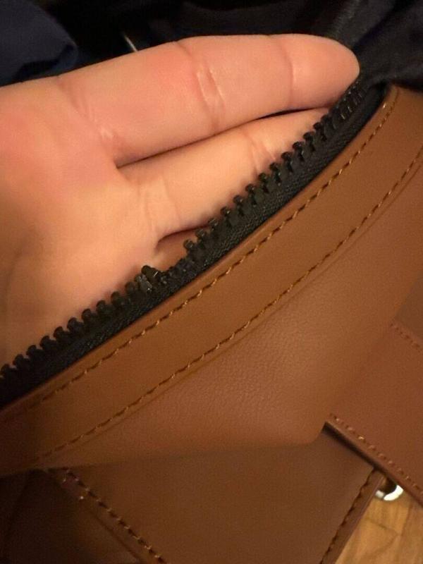 Customer photo for "Loved until the zipper broke"