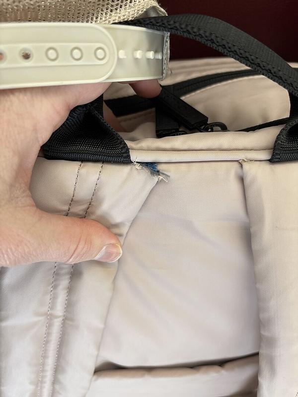Customer photo for "Straps tearing at the top"