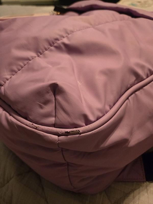 Customer photo for "I've only had the bag since March. . ."
