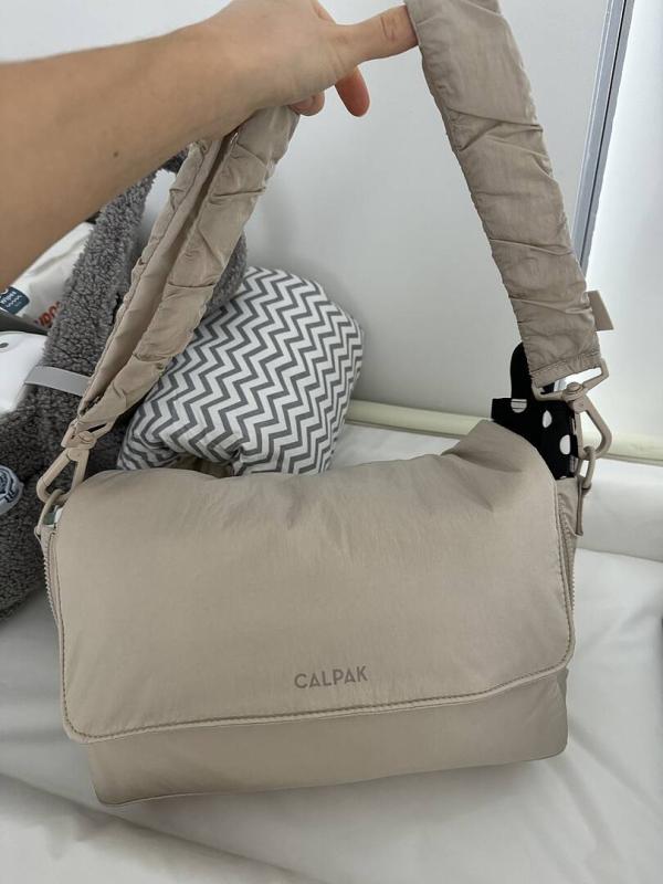 Customer photo for "Great bag for stroller, with"