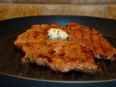seared steak with herbed goat's milk butter
