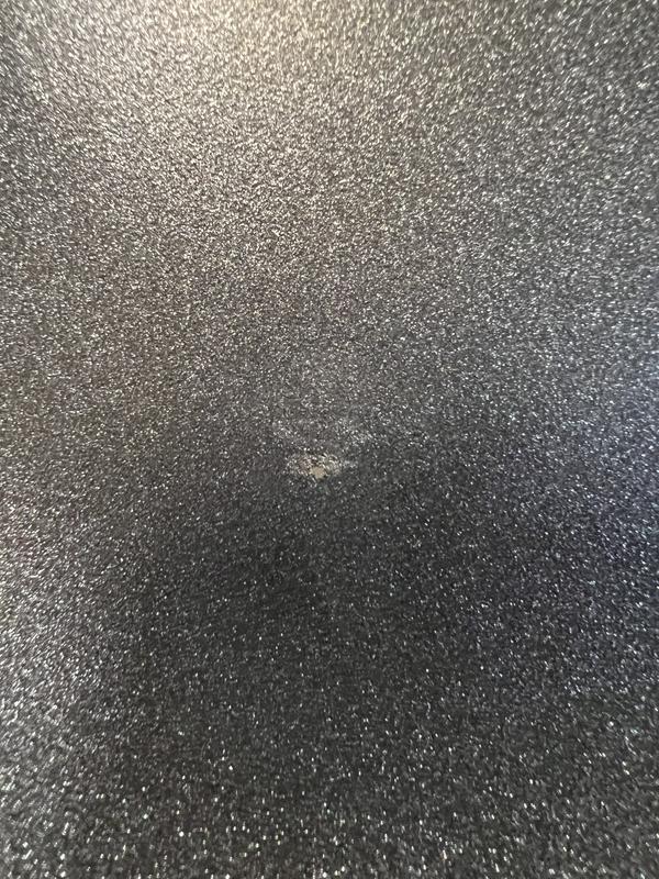 Chipped on the cooking surface of my smaller skillet