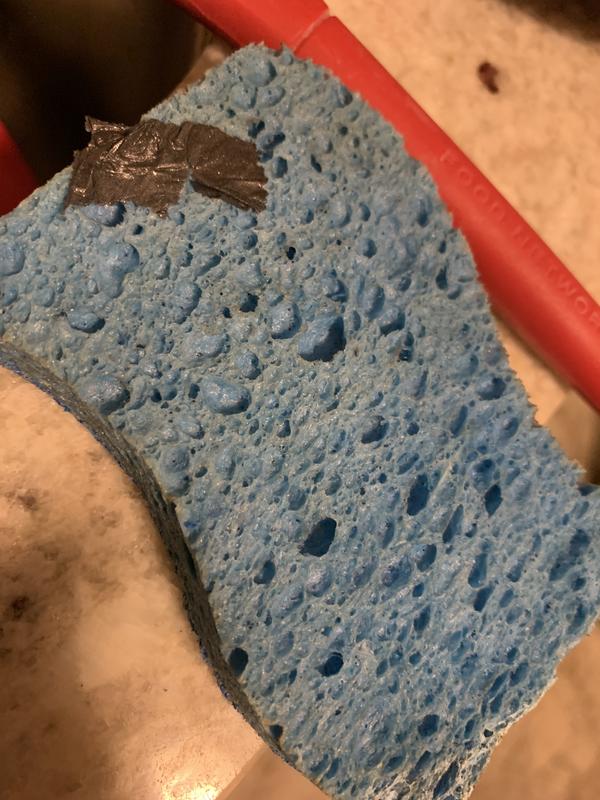 Used the soft side of the sponge and the coating came off like it was butter
