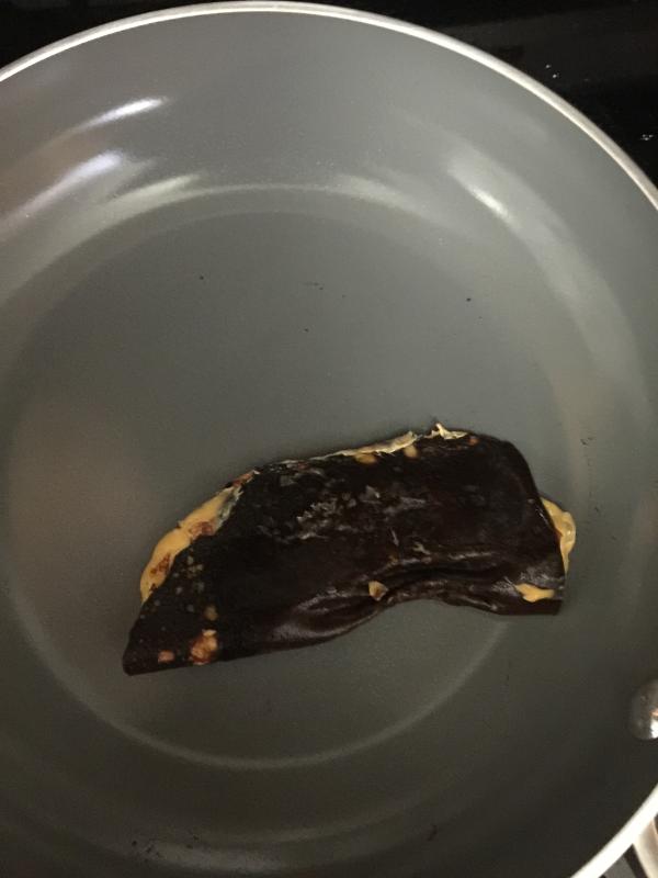 Cheese burnt to a crisp and still not sticking to pan!