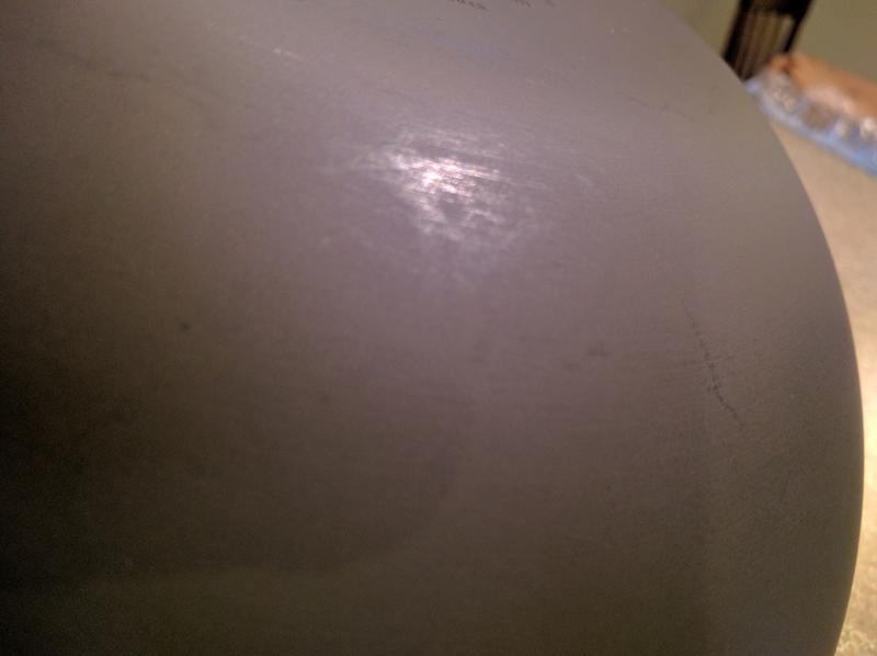 Scratches from hand washing in warm soapy water prior to first use