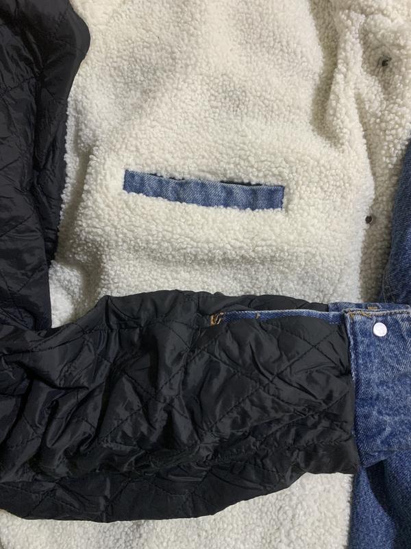 Inside sleeve and pocket detail CK denim Sherpa jacket