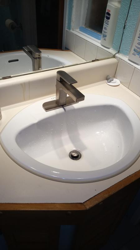 Installation sur un ancien lavabo à 3 trous