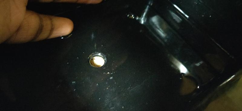 Underneath drainage tray filled with water